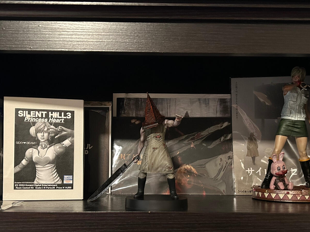 Red Pyramid Thing Statue On Shelf